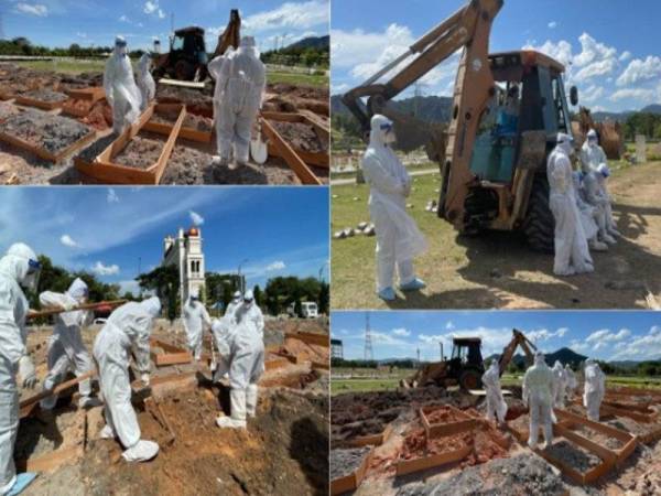Guna jentera pengorek kaut gali lubang kubur jenazah Covid-19 Guna jentera pengorek kaut gali lubang kubur jenazah Covid-19